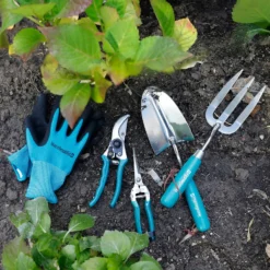 House Beautiful Stainless Steel Hand Trowel With A Teal Painted Hardwood Handle -Lifetime Sales 13188708 1694928022749481